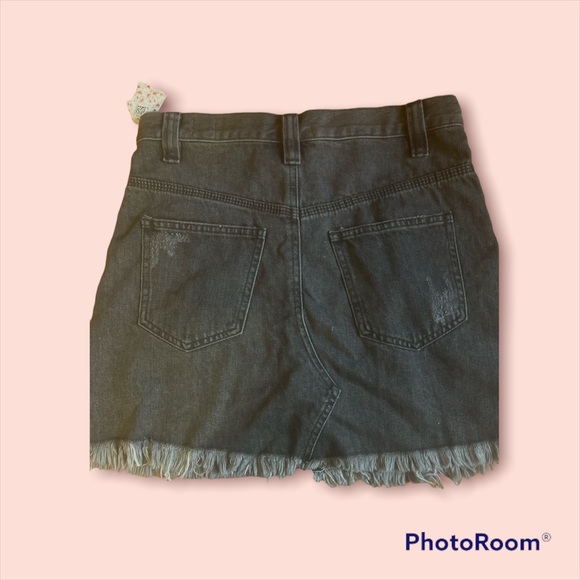 This is a a we the free mini denim skirt in sanded black color - Picture 3 of 3